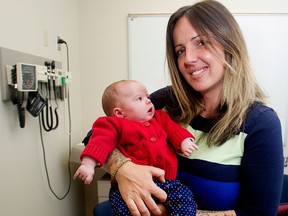 Jasmina Stewart holds her daughter Anastasia, who was treated with INSPIRE, Integrated Neonatal Support with Placental Transfusion and Resuscitation, at Foothills Hospital on Monday, Nov. 2, 2015. Anastasia was born premature at 30 weeks.