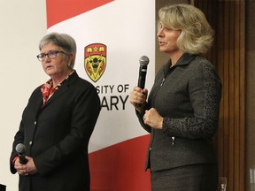 University of Calgary provost Dru Marshall, left, and University president Elizabeth Cannon speak during a town hall at the university on Nov. 18, 2015.