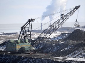 A giant drag line works in the Highvale Coal Mine to feed the nearby Sundance Power Plant near Wabamun in 2014.