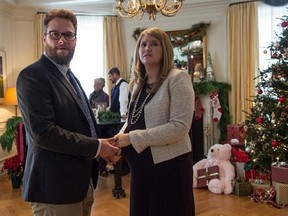 This photo provided by Columbia Pictures shows, Seth Rogen, left, as Isaac, and Jillian Bell as Betsy, in Columbia Pictures&#039; &ampquot;The Night Before.&ampquot; THE CANADIAN PRESS/AP/Columbia Pictures, Sarah Shatzvia
