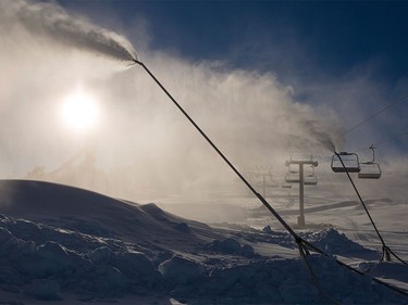 Snow machines at work at Canada Olympic Park Friday.