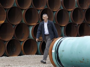 FILE - This March 22, 2012 file photo shows President Barack Obama arriving at the TransCanada Stillwater Pipe Yard in Cushing, Okla. Oklahoma leaders are praising the renewed momentum in Congress to approve construction of the northern leg of the Keystone XL pipeline, even though the project will have very little economic impact on the Sooner State.