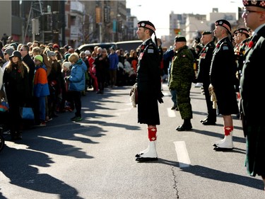 Members of the Calgary Highlanders march  during the annual Remembrance Day ceremony at Central Memorial Park.
