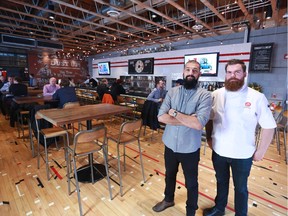 Gavin Young, Calgary Herald CALGARY, AB: NOVEMBER 20, 2015 - Home and Away general manager Sarmad Rizvi, left and executive chef Mike Pigot stand in the newly opened beltline restaurant on Friday November 20, 2015. (For You section story by John Gilchrist) Trax# 00070245A