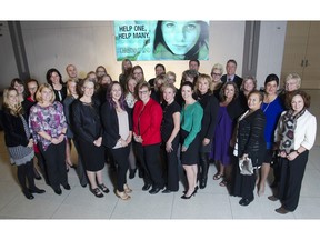 Representatives of the 2015 recipient agencies gather for a group photo at the Calgary Herald Christmas Fund 2015 launch Tuesday November 17, 2015 at Telus Spark.