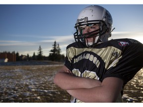 Crystal Schick/ Calgary Herald CALGARY, AB -- Willow McDougall, 13, who just found out that his Division 3 City Champs football team, the Bulldogs, might not play next year due to a lack of field and facilities, is photographed in an empty field near his home on November 22, 2015. --  (Crystal Schick/Calgary Herald) (For City story by  Erika Stark) 00070281A