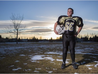 Willow McDougall, 13, who just found out that his Division 3 City Champs football team, the Bulldogs, might not play next year due to a lack of field and facilities, is photographed in an empty field near his home on November 22, 2015.