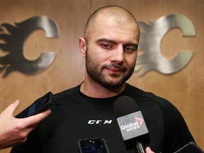 Calgary Flames captain Mark Giordano talks with the media on Wednesday a day after the Flames fell further into a hole following a loss to the Colorado Avalanche.