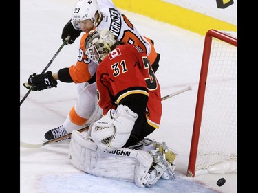 The Philadelphia Flyers score on Calgary Flames goaltender Karri Ramo during the second period of NHL action at the Scotiabank Saddledome on Thursday Nov. 5, 2015