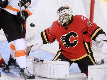 It was a close call on this Philadelphia Flyers scoring chance for Calgary Flames goaltender Karri Ramo during the second period of NHL action at the Scotiabank Saddledome on Thursday Nov. 5, 2015