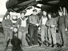 Lieut. Herbert Kramer Ruppe, second from left, after his 46th, and final, bombing mission in 1944.