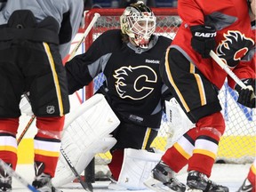 Calgary Flames netminder Karri Ramo patrols the crease during practice at the Saddledome on Thursday.