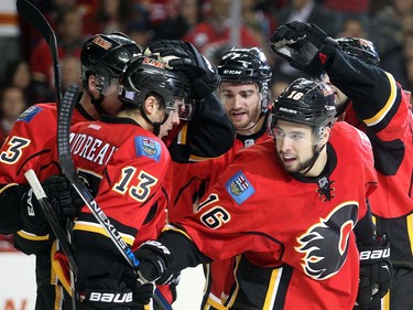 Josh Jooris of the Calgary Flames celebrates his first goal of the season against the Montreal Canadiens during second period  at the Saddledome Friday evening October 30, 2015.