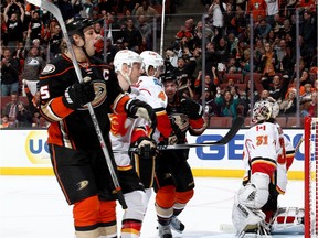 Former Calgary Hitmen star Ryan Getzlaf of the Anaheim Ducks celebrates one of his team's five goals — all set up by him — in a 5-3 win over the Calgary Flames on Tuesday night.