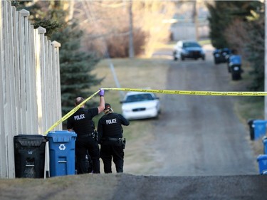 Police are investigating a death in the alley off of the 400 block of Hendon Drive in the alley in the community of Highwood on Sunday. November 15, 2015.