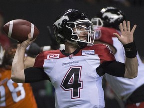 Calgary Stampeders' quarterback Drew Tate prepares to pass during the first half CFL football action against the B.C. Lions, in Vancouver, on Saturday, Nov. 7, 2015.