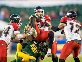 Calgary Stampeders receiver Simon Charbonneau-Campeau  comes down with the ball during a game against the Edmonton Eskimos last season. After breaking his leg in July, he is hoping to return for the playoffs.