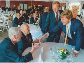 Calgary veteran Gordon Hill meets Dutch King Willem-Alexander.