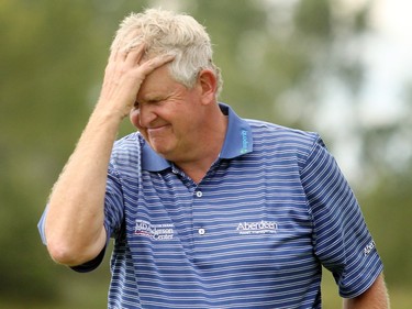 Champions Tour player Colin Montgomerie reacted after sinking his final putt on the 18th green during the final round of the Shaw Charity Classic at the Canyon Meadows Golf and Country Club on August 9, 2015.  Montgomerie had stated the day with a share of the lead but in the end, Jeff Maggert won the tournament with a score of -16.