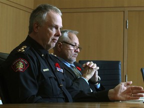 New Calgary police chief Roger Chaffin speaks to the Calgary Herald editorial board Monday, Nov. 9, 2015. To the right is Calgary police spokesperson Kevin Brookwell.