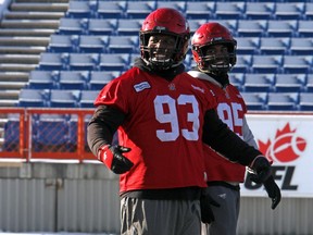 Calgary Stampeders defensive lineman Micah Johnson laughs during a pause at practice on Wednesday at McMahon Stadium.