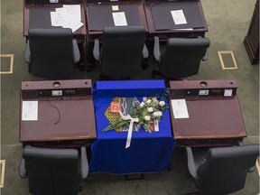 Memorial at the Alberta legislature on the desk of Manmeet Bhullar in the Chamber.