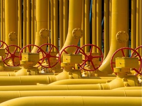 Valves and pipes converge at a natural gas processing plant.