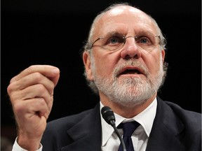 CEO Jon Corzine and other executives with MF Global have settled a class action suit co-led by Alberta's AIMCo by agreeing to pay $64 million, AIMCo says.