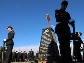Soldiers guard the cenotaph at the Military Museums on Remembrance Day.