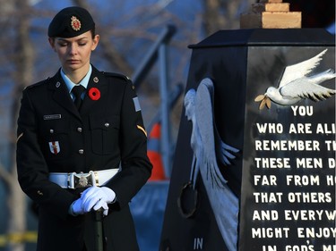 Soldiers guard the cenotaph at the Military Museums on Remembrance Day 2015.