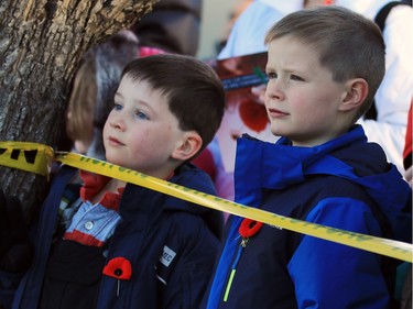 Young Calgarians watch the 2015 Remembrance Day service at the Military Museums in Calgary.