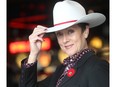 Heritage Park President and CEO Alida Visbach tips her cowboy hat in Gasoline Alley Thursday November 5, 2015. She received the  Mayor's White Hat Award this year and also was honoured with an Alberta Tourism Award.