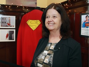 Irene Kerr, director curator of the Highwood Museum, with a new exhibit On Location: Film in the Foothills.  The exhibit includes Superman's cape, from the Christopher Reeve version of the movie.