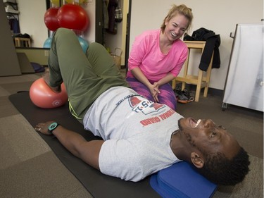 Tyrone Mullings, a brakeman for Joel Alexander, one of the two men's Jamaican bobsled teams, spends a relaxing day with his teammates away from the track, doing some physiotherapy, pilates and receiving massages at Maximum Potential Physiotherapy in Calgary, on November 14, 2015.