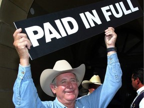 Ralph Klein declares the Alberta debt paid off in Calgary on July 12, 2004.