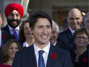 Prime Minister Justin Trudeau holds a news conference with his cabinet after they were sworn-in at Rideau Hall in Ottawa on Nov. 4.