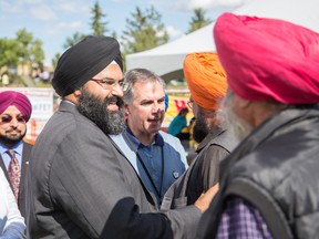 On Aug. 31, 2014, Tory MLA Manmeet Bhullar and PC Leadership candidate Jim Prentice (who later became premier) spoke to members of Calgary's Punjabi community at Prairie Winds Park in northeast Calgary.