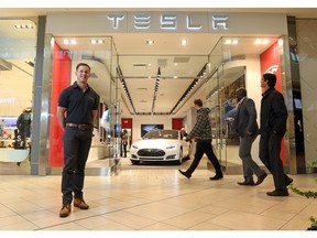 Manager of the new Tesla car shop, Chris Bishop, at CF Chinook Centre.