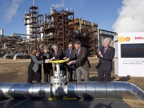 Officials open the valve to the Quest carbon capture and storage facility in Fort Saskatchewan on Nov. 6, 2015.