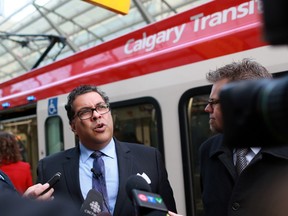 Mayor Naheed Nenshi speaks to the media after driving one of transit's new four-car trains into City Hall station on Friday November 13, 2015.