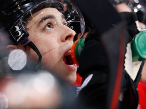 Johnny Gaudreau, seen taking a water break on the bench during Tuesday's game against New Jersey, has excelled at the 3-on-3 format.