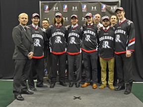 The Roughnecks pose with their draft class in Toronto in September (minus top pick Wesley Berg, who wasn't there). From left, assistant coach Bruce Codd, Jordan Kancsal (44th overall), GM Mike Board, Tyson Bell (24th), Reilly O'Connor (7th), Mitch de Snoo (13th), scout Brian Beisel, Jacob Ruest (35th), head coach/assistant GM Curt Malawsky and Kellen LeClair (25th).