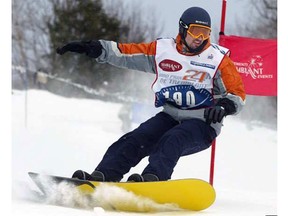 Justin Trudeau carves through a gate during a celebrity slalom race in Mont Tremblant, Que. Friday, Dec. 12, 2003.