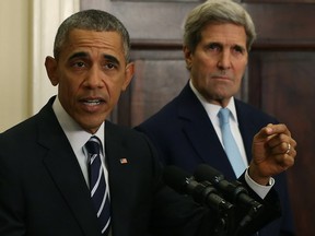 U.S. President Barack Obama, with U.S. Secretary of State John Kerry, announces his decision to reject the Keystone XL pipeline proposal, at the White House.