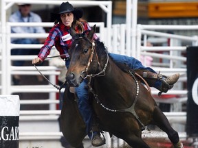 Deb Renger (now Deb Guelly), seen competing at the 2009 Calgary Stampede, is back at the Wrangler National Finals Rodeo for the first time in seven years.