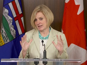 Alberta Premier Rachel Notley answers questions from the media after giving a speech to the Alberta Association of Municipal Districts and Counties at the Shaw Conference Centre in Edmonton on Nov. 19, 2015.