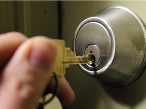 UNDATED -- Photo illustration of Kier Gilmour locking his pad. Postmedia News photo.  TAGS: key, door. condo, house, lock, keys, home, lock. ORG XMIT: POS1302151706569937