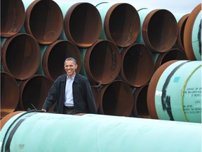 U.S. President Barack Obama arrives to speak in this March 22, 2012 file photo at the TransCanada Stillwater pipe yard in Cushing, Okla.