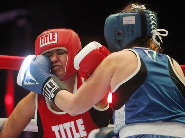 Calgary's Karla Truba, left, and Sheila Morrison stepped into the boxing ring for a charity match to help Ring to Knock Out Diarrhea as part of the Clean Fight on November 19, 2015 at Cowboys Casino. The money the women raised is being used to design and create hygienic latrines and facilities in rural Ghana.