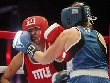 Calgary's Karla Truba, left, and Sheila Morrison stepped into the boxing ring for a charity match to help Ring to Knock Out Diarrhea as part of the Clean Fight on November 19, 2015 at Cowboys Casino. The money the women raised is being used to design and create hygienic latrines and facilities in rural Ghana.